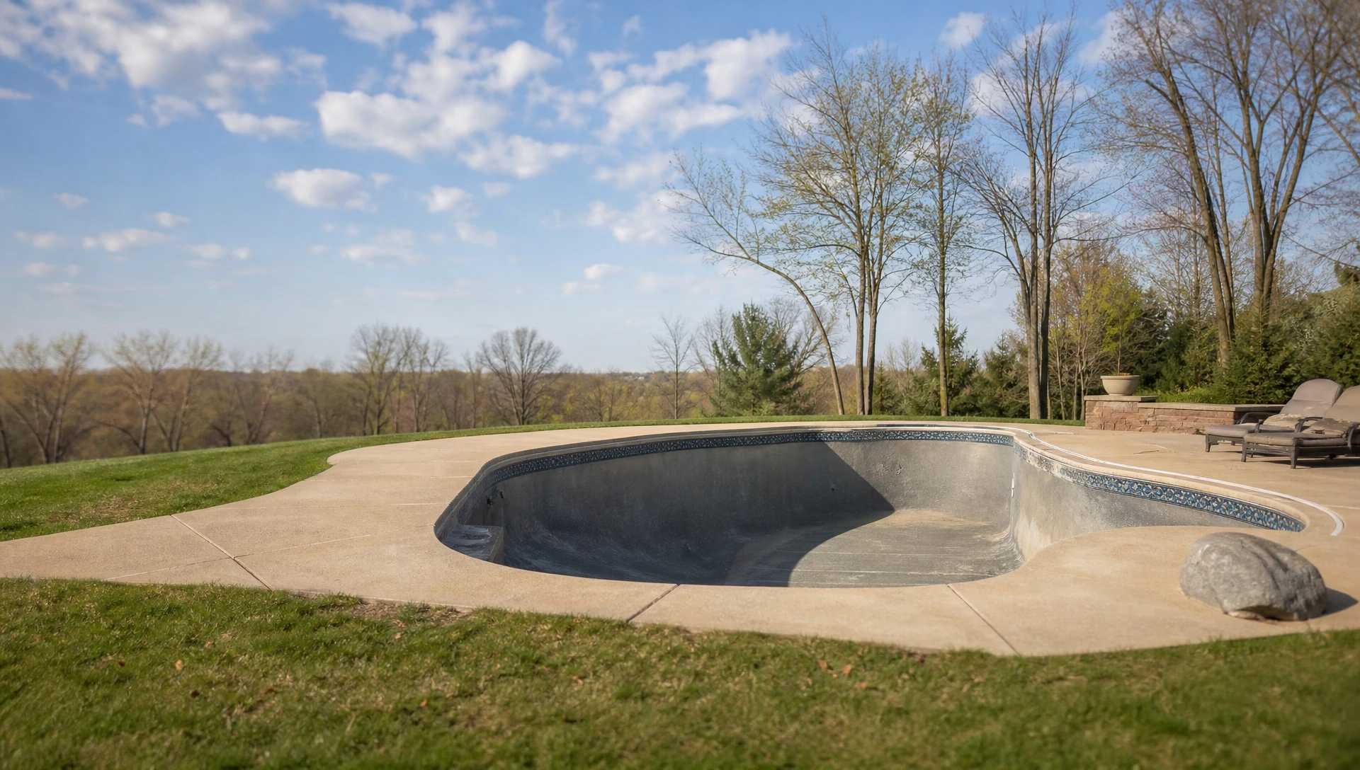 An in-ground pool in a Northeast Ohio garden