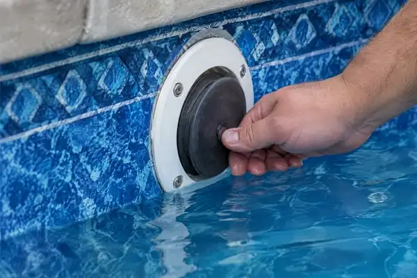 A winterising plug fitted in a pool return